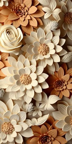 an arrangement of paper flowers in various colors