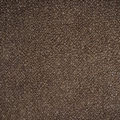 a brown carpet textured with some sort of fabric or material that looks like it is woven