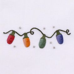 a string of christmas lights on a white background