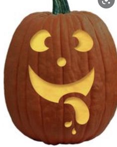 a carved pumpkin with an angry face on it