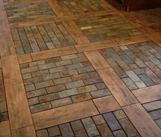 the kitchen floor is made out of wood and tile