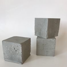 three cement blocks stacked on top of each other