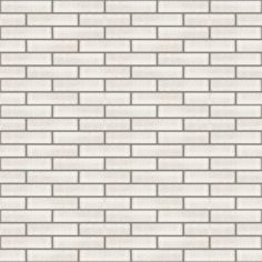 a white brick wall textured with light gray bricks