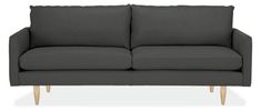 a gray couch with wooden legs on a white background