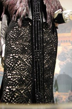 a mannequin dressed in black and white lace