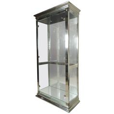 a tall metal and glass display case