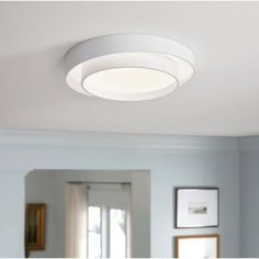 a white ceiling light in a living room