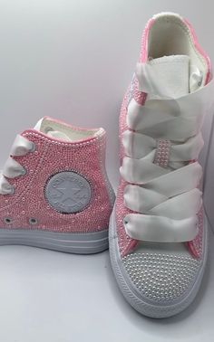 "Pearl HighTop Custom Bling Converse Unisex. Personalize Bridal, Wedding, Sorority, Sweet 16, Anniversary, Party Shoes Bedazzled Gift Idea, Quinceanera, Can do any color requested.. These Converse are a custom color. Normal converse do not come in this particular color. These are special made. Do undertsand custom made orders take a little more time. Disclaimer: PLEASE READ SHOP POLICY BEFORE PURCHASING!! I'm willing to rush your order if you're willing to pay my rush fee. Please ask all questions BEFORE you purchase from my shop. I reply back to customers fairly quickly. All sales are final. It is your obligation to know the correct size needed in Converse before you order. If you receive shoes that are too big or too small, I cannot refund or exchange since they are personalized. If you Quince Shoes Converse, Pink Glitter Converse, Normal Converse, Bedazzled Shoes Diy, Quinceanera Shoes, Glitter Converse, Bedazzled Shoes, Bling Converse, Custom Bling