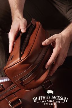 Traditionally made of canvas or leather, a men’s toiletry kit (aka Dopp Kit) is more than just what you dump your shaving products into. It’s worth finding a bag, roll, or hanging kit designed with organization for men in mind (i.e. no packing tutorial required). It should hold all your travel essentials AND fit in your carry on. Perfect for business or adventure travel. Great gift for him. Organization For Men, Travel Accessories For Men, Shaving Products, Leather Passport Wallet, Leather Dopp Kit, Leather Travel Wallet, Casual Professional, Travel Necessities, Mens Travel