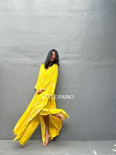 Uluwatu Kaftan dress" Soft, Smooth, Lightweight Rayon voile Fabric. Perfect for Elegant Day and Nightwear or worn as a cover-up for that beach or poolside statement of glamour. And for Muslim women   Color - Bali  Tie Dyed Lemon yellow & multi motif Measurements in CM and Inches.  Size American measurement is Medium to Large.  It fits all the body sizes between M to2XL Size - One size fits all American size From M to 2XL Total wide /240cm/94inch(round) Chest & him /180cm/70inch(round) The length /140cm/55inch We recommend all types of ladies you can surly accessorize with it to create your glamorous looks.  👉Please choose carefully Color & Size 👈  Iphone 14Photos therefore, the color can be slightly different between the real products and photos. Yellow Flowy Dress For Beach Cover-up, Flowy Long Kaftan For Summer, Flowy Floor-length Beach Dress For Festivals, Flowy Long Beach Dress As Beach Cover-up, Flowy Floor-length Boho Dress For Beach, Flowy Boho Floor-length Dress For Beach, Flowy Floor-length Beach Dress Cover-up, Yellow Maxi Beach Cover-up Dress, Flowy Floor-length Boho Beach Dress