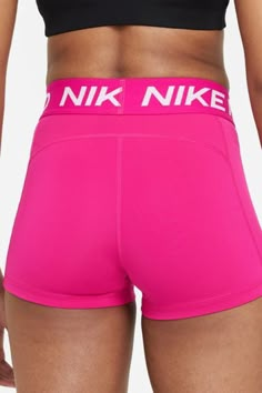 Stretch-fit athletic shorts from Nike. Pull-on silhouette hugs every curve, topped with a logo-printed high waistband. Content + Care. ImportedSize + Fit. Model is wearing size Small Athletic Clothing, Performance Leggings