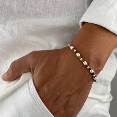 MENS FRESHWATER PEARL BRACELET Discover the privilege that perfect pearl bracelets for modern people will create in your style. Make a difference with your compliment-worthy style. You can find special design real pearl hematite gold bracelets only in our store. Just for you!  Features of the bracelet: - Pearl size: 6mm  - Diamond Cut Rhodium Gold Bead - Hematite - Clasps:  Stainless steel gold lobster clasp  You may choose extra chain extension (1 inches - 2,5 cm) - Design code: MGB0085 👉SIMPLY MESSAGE US FOR CUSTOM LENGTH NOT LISTED. ** You should see the necklaceof this special design bracelet. 👇 https://www.etsy.com/listing/1789441951/mens-freshwater-pearl-necklace-with ## I have a special offer for you. You can buy the necklace and bracelet as a set with a 10% discount. ❤️## 👇  The Pearl Bracelet For Men, Modern White Adjustable Pearl Bracelet, Modern White Pearl Bracelet For Gift, Modern White Pearl Bracelets, Beads Bracelet Design For Men, Men’s Beaded Bracelet, Pearl Bracelet Men, Men Gold Bracelet, Bracelet For Men Gold