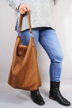 "Oversized bag - large leather tote bag -XXL handbag BROWN LEATHER BAG Height: 46 cm / 18.2\" Width: 43 cm / 17\" Width at the base: 32 cm / 12.6\" Min handle drop: 20 cm / 10.2\" Length of handle: 44 cm / 17.3\" Long strap: max 110 cm / 43.5\" Depth: 13 cm / 5.1\" Large and stylish tote bag made from high quality leather. Spacious interior provides room for all the daily essentials and more. This bag is perfect as your everyday bag, which can fit an IPAD, A4 files, books, magazines, cosmetic ba Large Rectangular Leather Bag, Large Rectangular Leather Shoulder Bag, Large Rectangular Shoulder Bag For Everyday Use, Everyday Use Large Rectangular Shoulder Bag, Large Double Handle Hobo Bag For Daily Use, Large Double Handle Bucket Bag For Everyday Use, Large Brown Satchel For Everyday Use, Brown Large Satchel For Everyday Use, Large Everyday Hobo Shoulder Bag