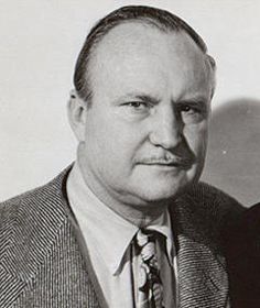 black and white photograph of two men in suits