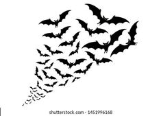 a flock of bats flying in the sky