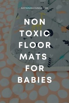 a baby bib with the words non - toxic floor mats for babies