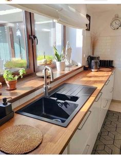 the kitchen counter is clean and ready for us to use in the day or night