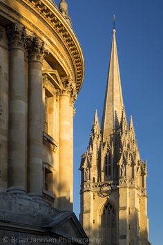 an old building with a steeple in the background