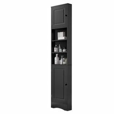 a tall black cabinet with shelves and bottles on the bottom shelf, in front of a white background