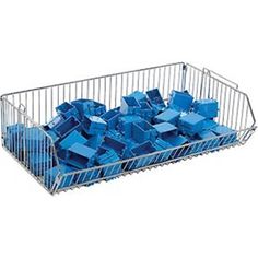 a metal basket filled with blue cubes