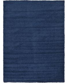 a blue rug with fringes on it