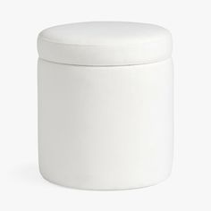 a white round storage container on a white background