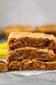 three pieces of cookie bars stacked on top of each other