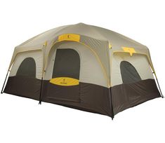 a tent that is set up with the door open and it has two windows on each side