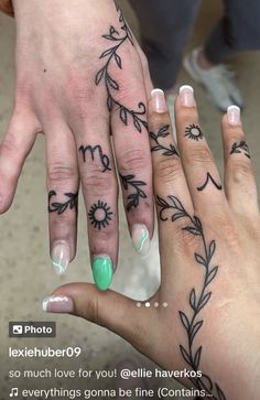 two people with matching tattoos on their hands