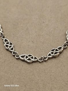 Wonderful Celtic Knot style Necklace.Sterling Silver marked on the back and on the clasp. It measures 18 inches with a bit extra. One of the classic but simpler celtic knots.Can be worn with your jeans or on an evening out ti someplace fancy.This will become one of your go to peices of jewlery. Very good condition,appears to have been worn very little. Celtic Knots, Style Necklace, Necklace Sterling Silver, Celtic Knot, Link Necklace, Vintage Sterling Silver, Necklace Etsy, Jewelry Necklace Pendant, Knot