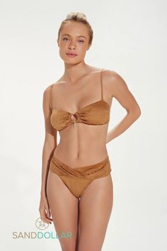 Unique and eye-catching, this caramel coloured, suede-effect bandeau bikini top is the perfect beach wear. Featuring a cutout ring detail, gold accents and removable, adjustable, over-shoulder straps it blends style and practicality perfectly. Team it with the matching full briefs to complete the look. Show off yours with #StylesBySandDollar Bandeau style Muted gold colour Removable adjustable over-shoulder straps Keyhole cutout Fully lined Laser cut design 24 carat gold plated detailing Laser Cut Fabric, Laser Cut Design, Lasercut Design, Beach Wears, Beach Wear, Wide Waistband, Cut Design, Toffee