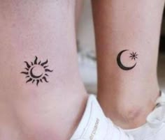 two sun and moon tattoos on both legs, one with the same tattoo as the other