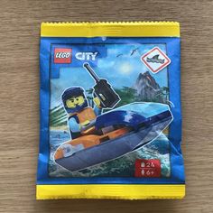 the lego city boat is in its packaging