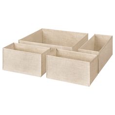 three beige linen storage bins with handles