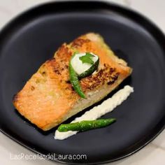 a black plate with some food on it