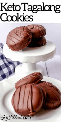 two white plates with chocolate cookies on them