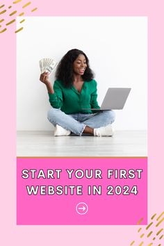 a woman sitting on the floor with her laptop and holding money in front of her