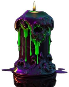 a candle that is covered in green and purple liquid