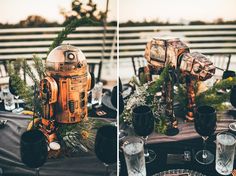 the table is set up with star wars themed decorations and plates, glasses, and napkins