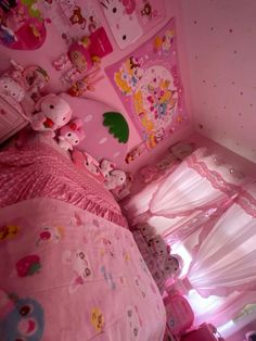 a pink bedroom with hello kitty bedding and curtains