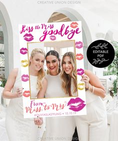 three women holding up a photo frame with lipstick on it