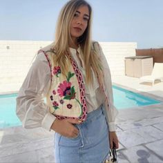 Capture The Essence Of Bohemian Chic With Our Embroidered Vest, A Wardrobe Essential For Every Free Spirit. Its Versatile Cropped Design Lends Itself To Effortless Layering In The Summer Or Standalone Wear In The Fall. Adorned With Intricate Floral Embroidery, It Adds A Whimsical Touch To Any Ensemble. Whether You're Off To A Festival, A Picnic, Or Simply Exploring The Town, This Vest Promises To Make A Statement Wherever You Go. Boho Women's Embroidered Vest Details: Boho Vest Vintage Floral Em Spring Pink Bohemian Embroidered Top, Pink Embroidered Top For Spring Vacation, Pink Embroidered Top For Vacation In Spring, Casual Pink Top With Floral Embroidery, Casual Pink Embroidered Top With Floral Design, Boho Vest Outfit, Bohemian Vests, Embroidered Vest, Boho Vest