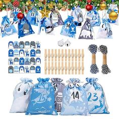 blue and white christmas decorations with wooden utensils