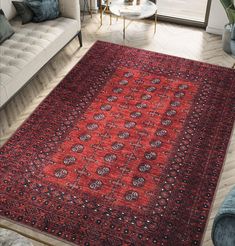 a living room area with couches and rugs