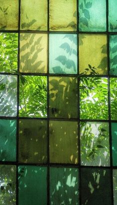 green and yellow glass tiles with leaves in the middle metal print by panoramic images