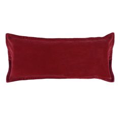 a red velvet pillow on a white background