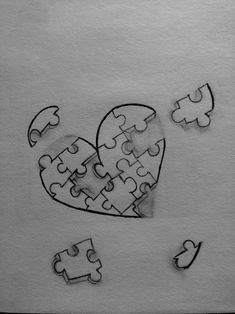 a drawing of a heart made out of puzzle pieces with one missing from the other