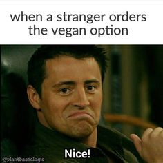 a man sitting in a chair with the caption, when a strange order orders the vegan option nice