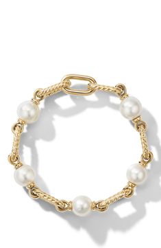 A mix of polished and spiraling links gleam along this 18-karat gold bracelet with cultured South Sea white pearls. 8 1/2" length Push-clasp closure 18k gold/cultured pearl Made in Italy Erin Mac Jewelry, Plunder Jewelry 2022, David Yurman Bracelet, Preppy Jewelry, Jewelry Accessories Ideas, Dope Jewelry, Classy Jewelry, Jewelry Essentials, Jewelry Lookbook