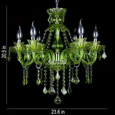 a green chandelier hanging from the ceiling in front of a black background with measurements